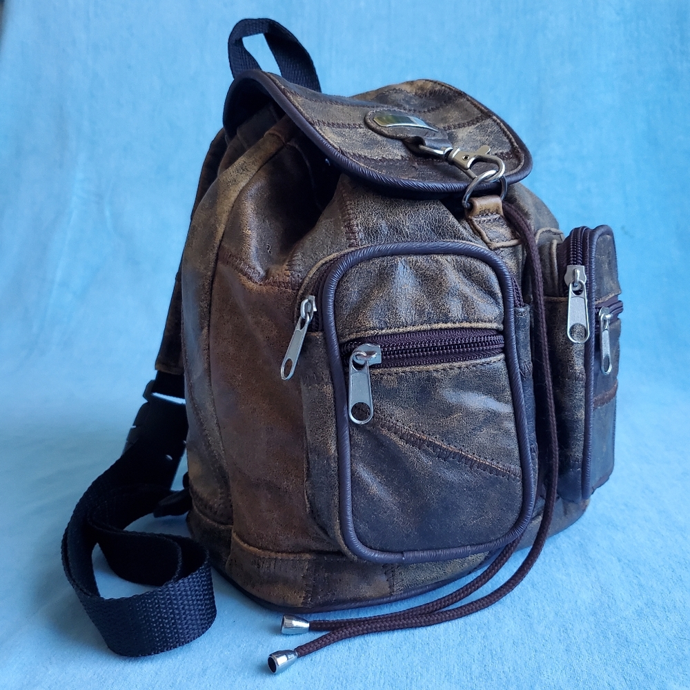 SMALL LEATHER MEXICAN BACK PACK WITH ADJUSTABLE STRAPS AND 4 POCKETS